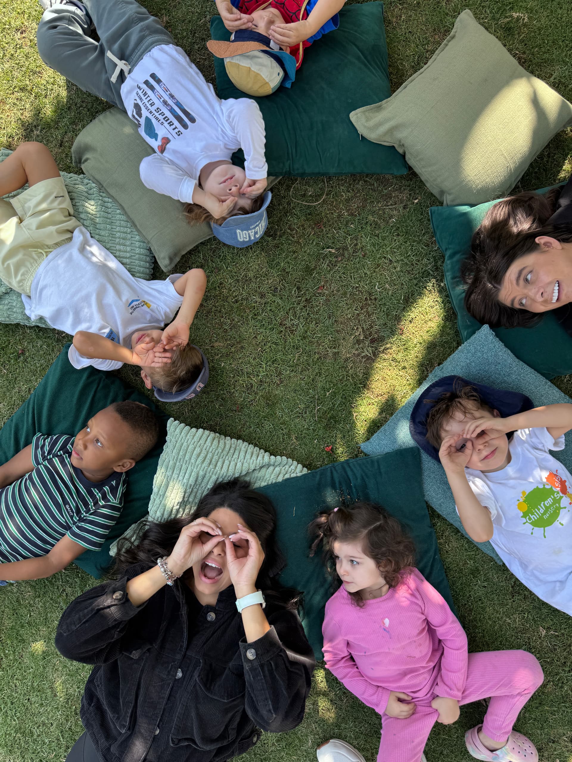Children engaged in outdoor learning at Forest Oasis Nursery